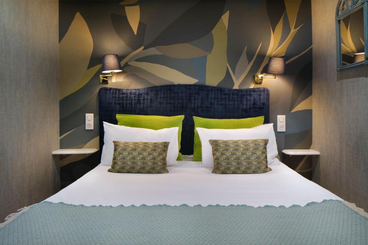 Logis Hotel Les Fuchsias แซ็ง-วา-ลา-อูเก ภายนอก รูปภาพ